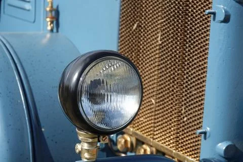 Round headlight for old tractor Stock Photos