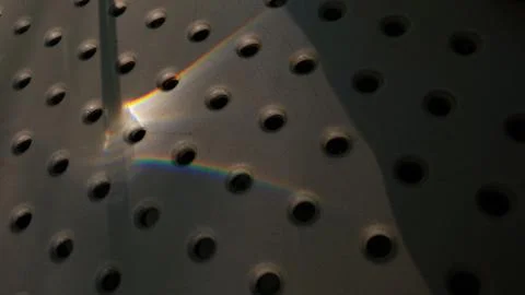 Round hole pattern background with shiny sunny bunny Stock Photos