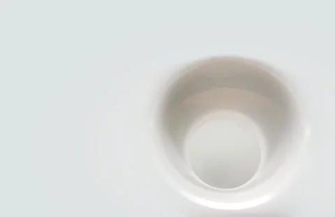 Round hole in white plastic surface close up Stock Photos