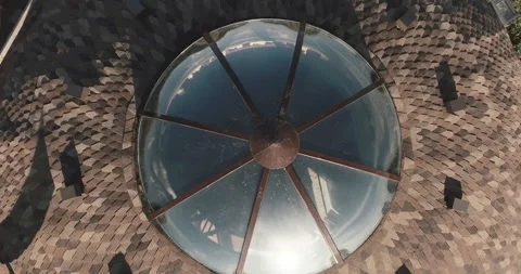 Round house. Top view. Camera moving up with a twist. Video stock 131187376