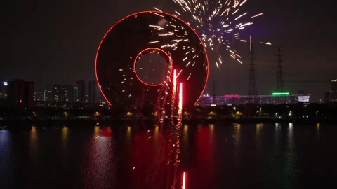 Round illuminated chinese building with firework background. Circle landmark. Stock Footage 340617525