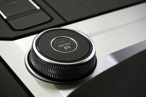 Round key for controlling car functions. Stock Photos