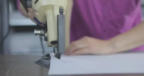 Round Knife Cutting Machine. Garment Automation. Sewing factory, apparel Stockbeeldmateriaal 330198642