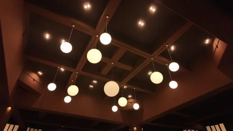Round lamp hanging on the wall Stock Footage 276484525