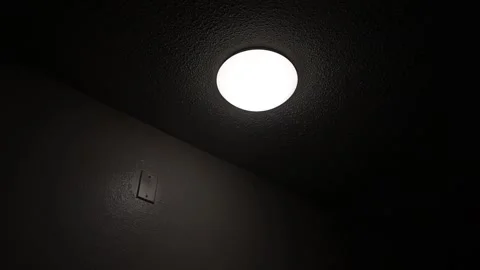 A round light in a dark room Stock Footage 142849218
