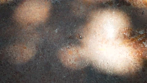 Round light spotsof on the old rusty metal surface. Background, structure. Stock Footage 165724837