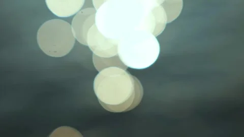 Round lights reflecting into water Stock Footage 318032689