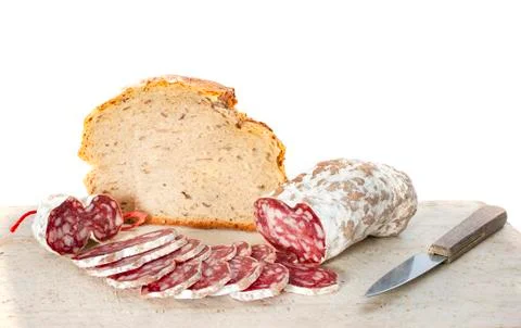 Round loaf and saucisson Stock Photos