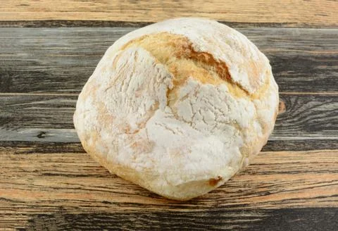 Round loaf of baked bread Foto stock
