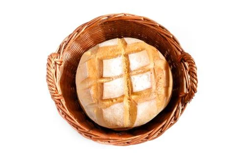 Round loaf of bread in weaved basket Stock Photos