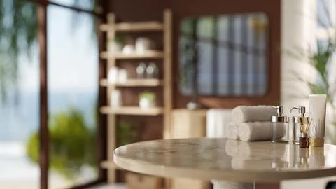 A round marble table features towels and bath products, set in a modern, br.. Ilustración de archivo