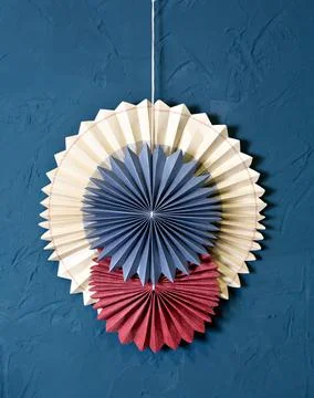 Round paper harmonica Interior decoration: paper circles on the blue wall Photos
