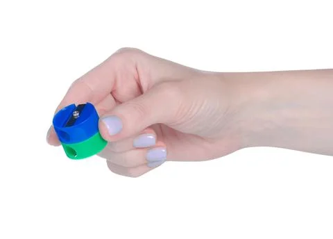 Round pencil sharpener in hand Stock Photos