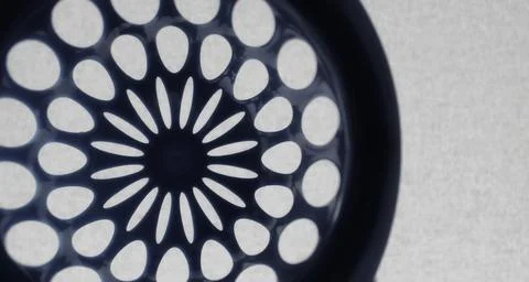 Round perforated pattern similar to the design of an aircraft turbine Stock Photos
