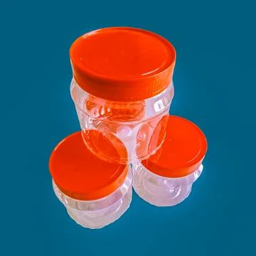 Round plastic containers Stock Photos
