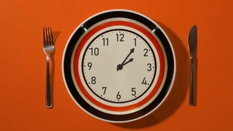 Round plate clock hands with colored outline move fast Stock Footage 142070364