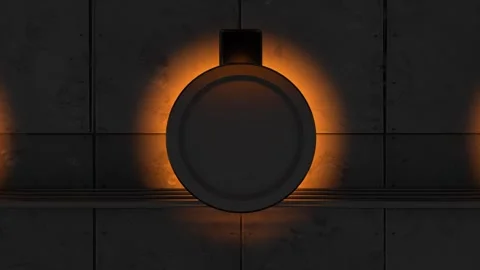 Round Porthole on Concrete Wall with Glowing Orange Halo Ring Stock Footage 346780717