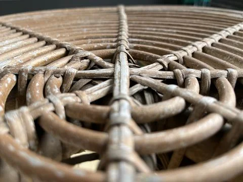 Round rattan table with circular pattern Stock Photos