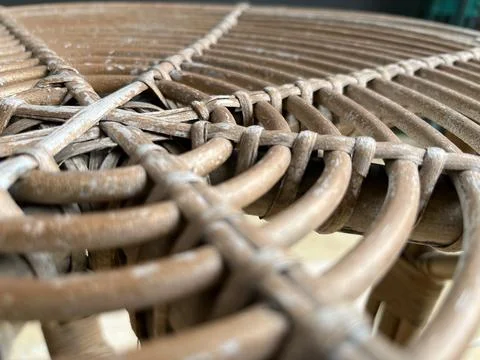 Round rattan table with circular pattern Stock Photos