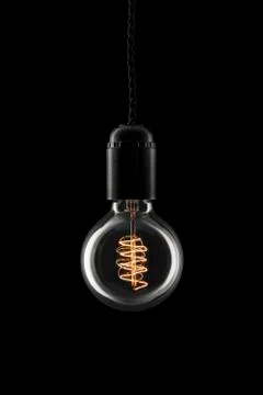 Round retro lightbulb - light on Stock Photos