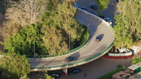 Round road junction with overpass. Overhead roadway Stock Footage 186532640