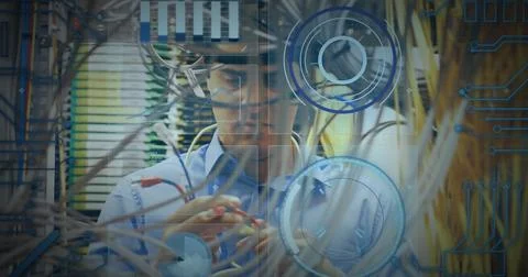 Round scanners and microprocessor connections against caucasian male engineer Stockfoto's
