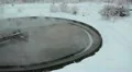 Round settler with overflowing water in winter season HD Footage