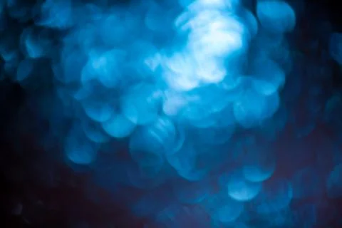 Round shape defocus lights are blue. Material for the designer. Blurred bokeh Foto stock