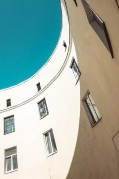 Round shape house with windows and blue sky Stock Photos