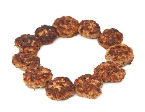 Round shape made of cutlets isolated over white background Stockfoto's