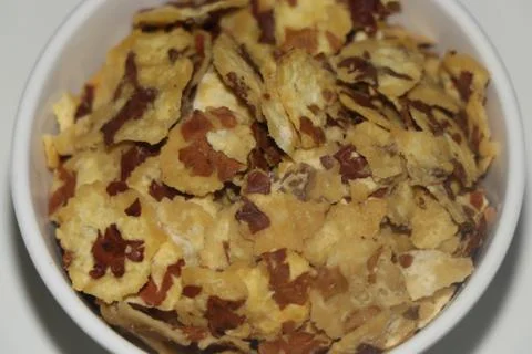 Round shape snacks put in white bowl Stock Photos