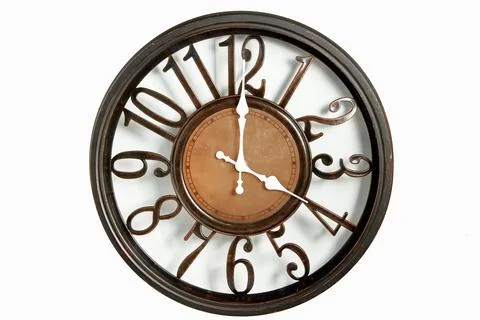 Round shape wall clock on a white background. Stock Photos