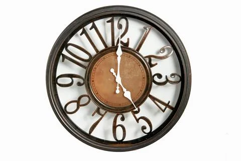 Round shape wall clock on a white background. Stock Photos