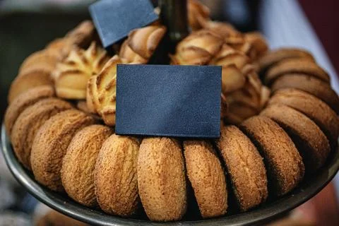 Round-shaped wheat biscuits displayed on a tray Stock Photos