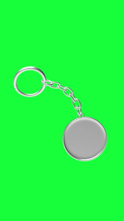 Round silver keychain rotating on green screen in 3D animation. Stock Footage 338227159