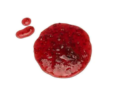 Round spot of raspberry jam isolated on white background from top view Stock Photos