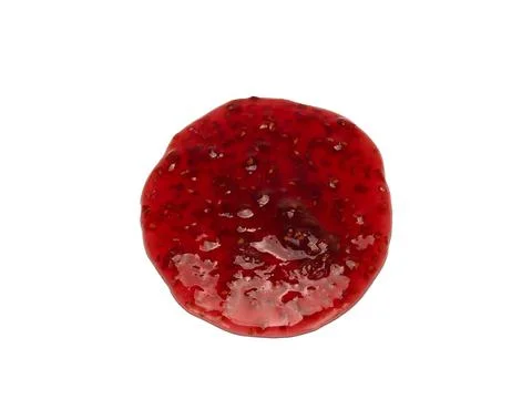 Round spot of raspberry jam isolated on white background from top view Stock Photos