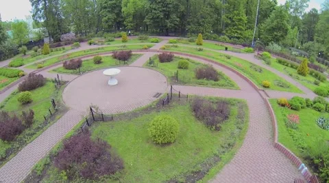 Round square of small rosarium in park Sokolniki at spring day Stock Footage 44540299