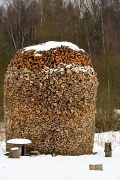 Round the stack of firewood Stock Photos