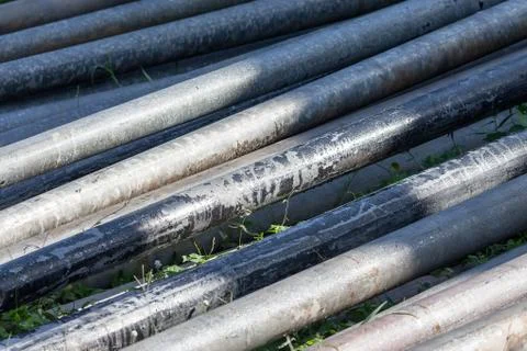 Round steel plate exposed to the sun. Stock Photos