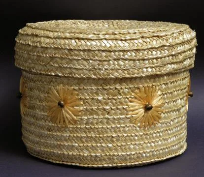 Round straw wicker box Stock Photos
