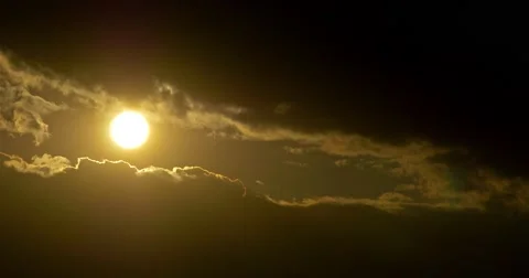 Round Sun Disc Visible Through Clouds At Sunset Stock Footage 66696039