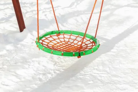 Round swing in winter Stock Photos