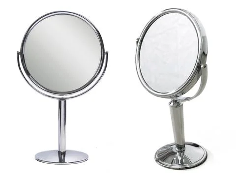 Round table mirror on a white background Stock Photos