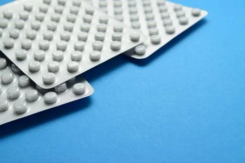 Round tablets in blisters Stock Photos