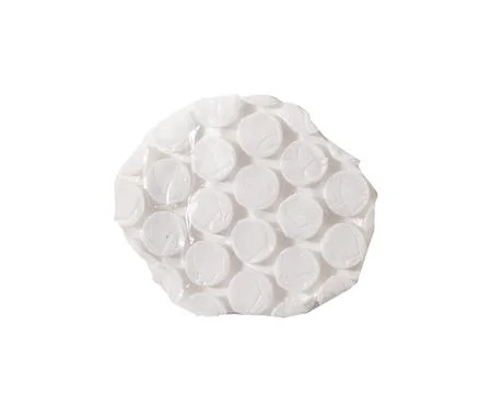 Round torn fragment of transparent bubble wrap with inflated air pockets and Stock Photos