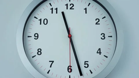 Round wall clock isolated on white background. Stock Footage 230114622