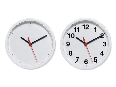 Round wall clock on white background Foto stock