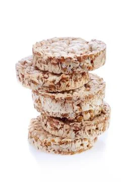 Round wheat crispbread, white background. Composition of crispbread on white Stock Photos