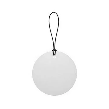 A round white blank tag with a string attached hanging against a white back.. Illustrazione stock